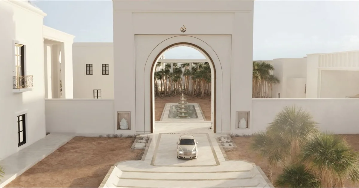 Villa marocaine blanche avec portail en arc et allée bordée de palmiers — visuel du site ADYAM Group